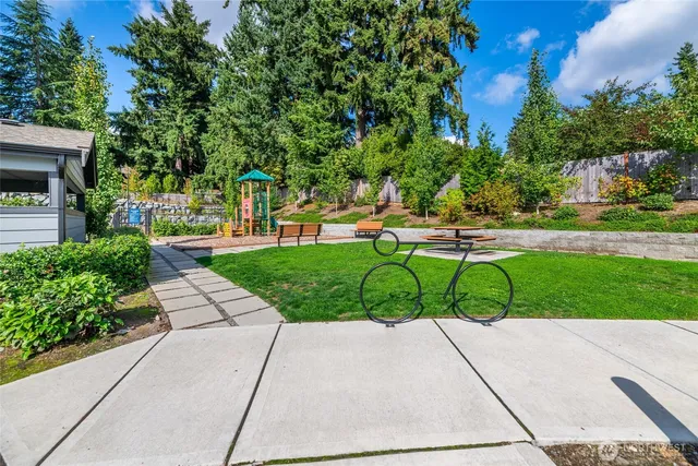 a view of a pathway with a bench