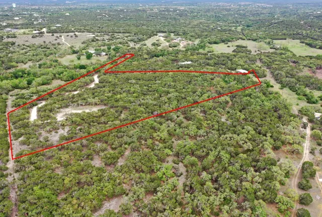 a view of a field with an outdoor space