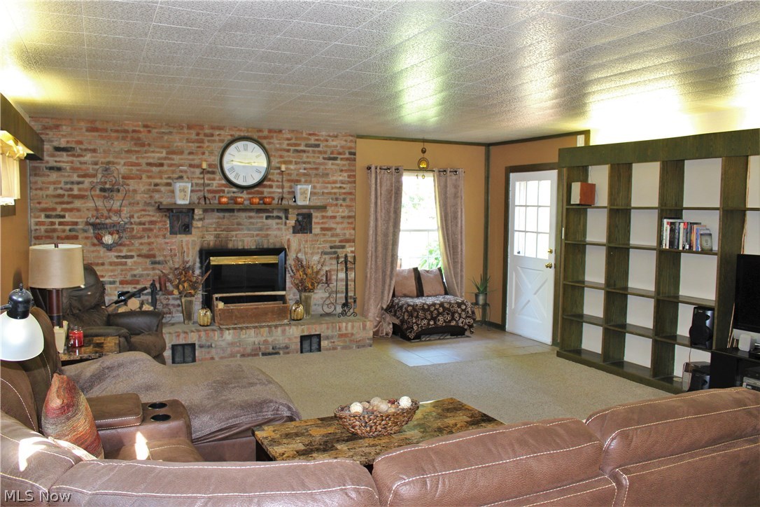 10471 Prouty Road Painesville, OH 44077 - Photo 12 of 33 Family Room with exit to the patio.