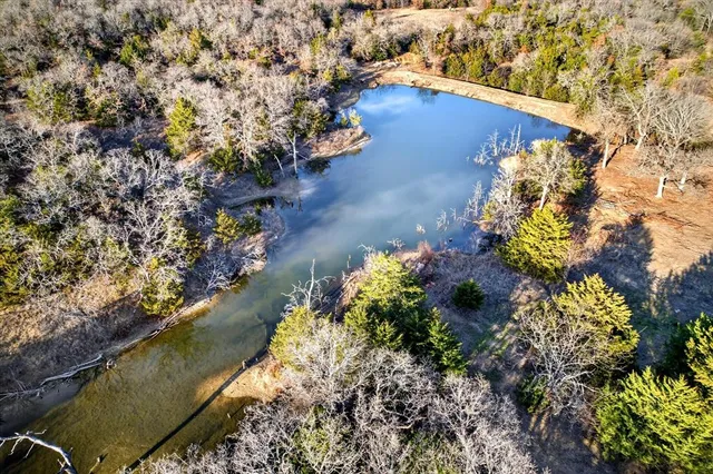 a black and white photo of a lake