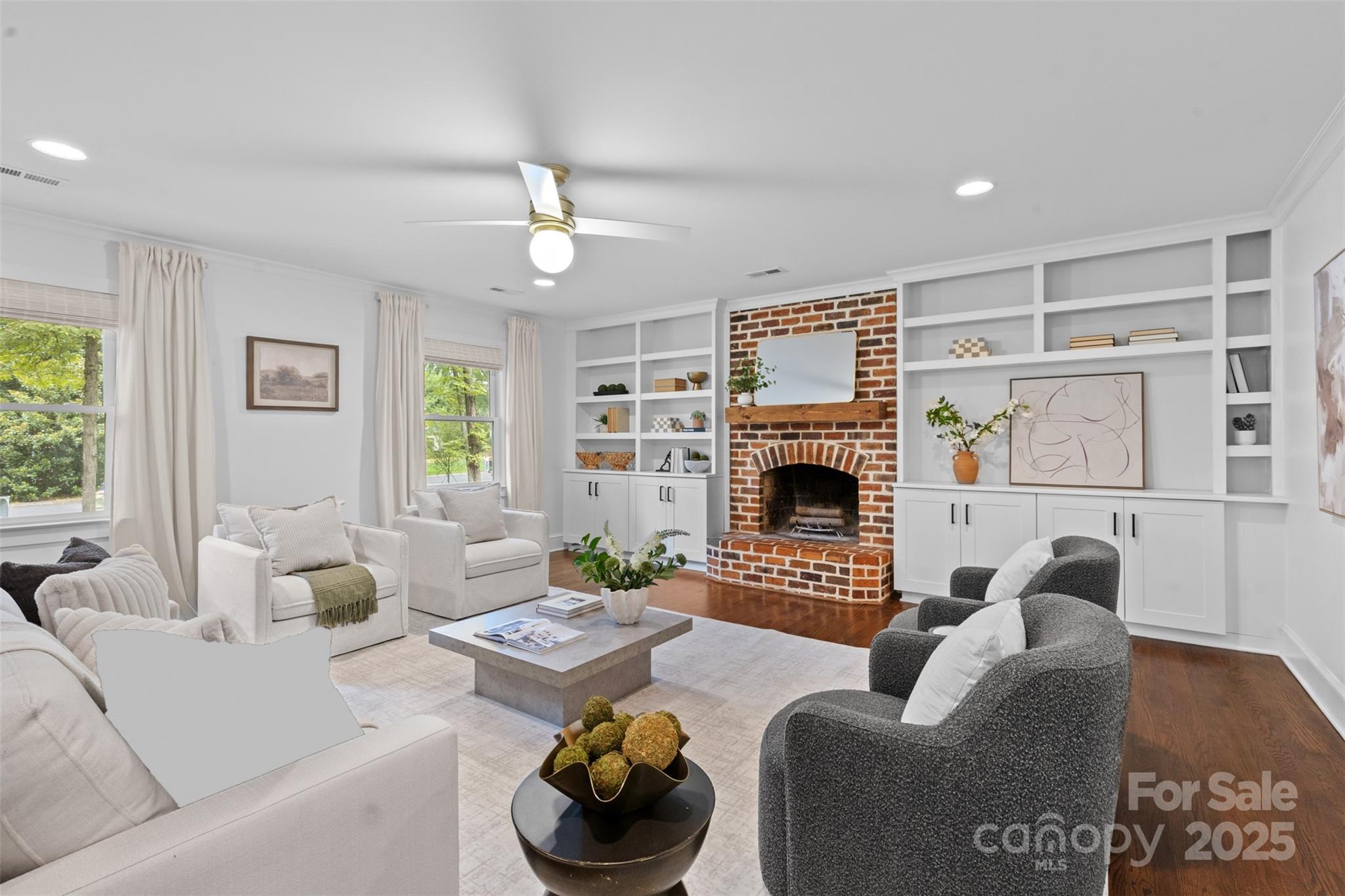 5611 Robinhood Road Charlotte, NC 28211 - Photo 14 of 48 a living room with furniture and a fireplace