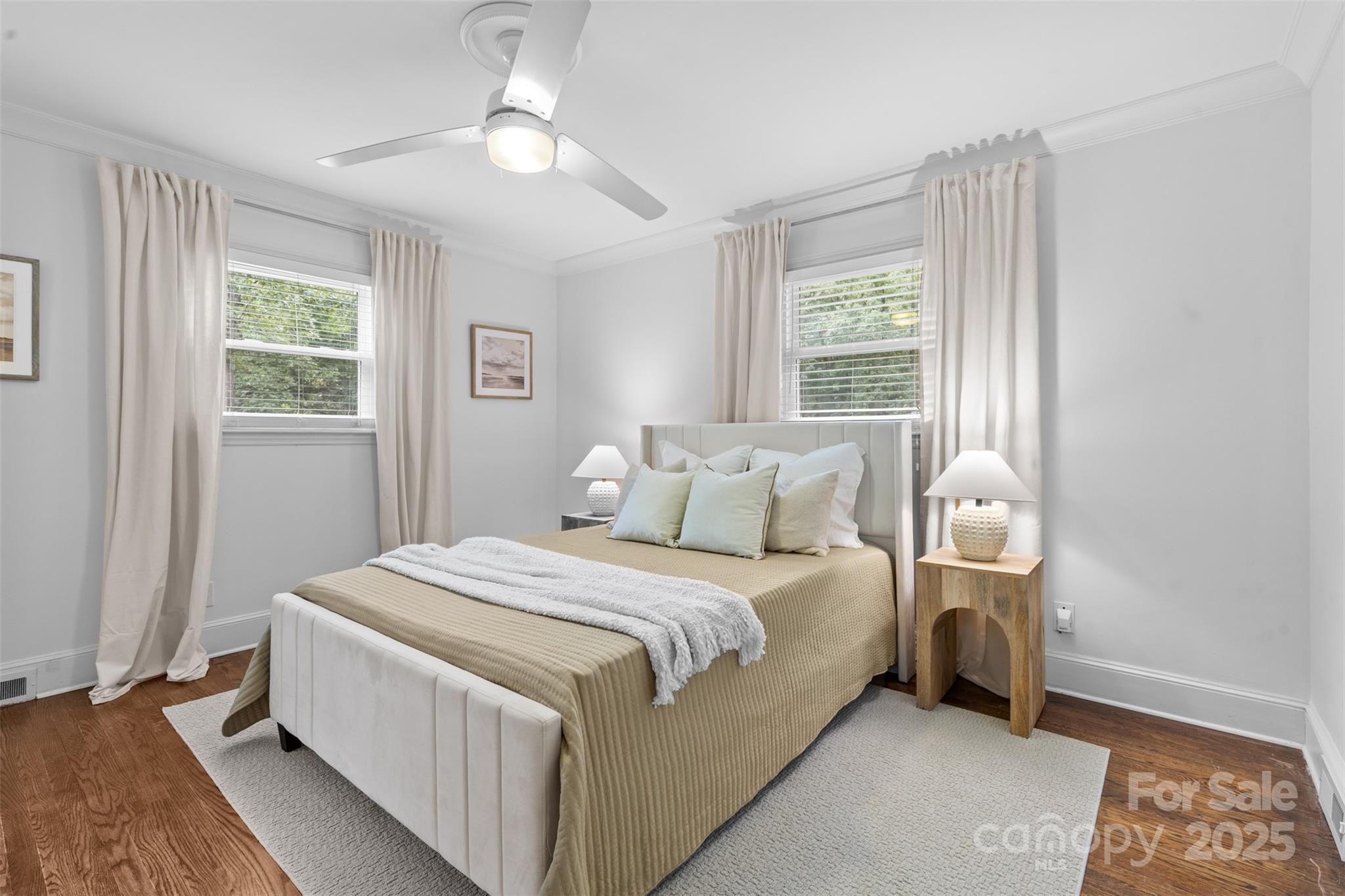 5611 Robinhood Road Charlotte, NC 28211 - Photo 21 of 48 a bedroom with a bed and a window