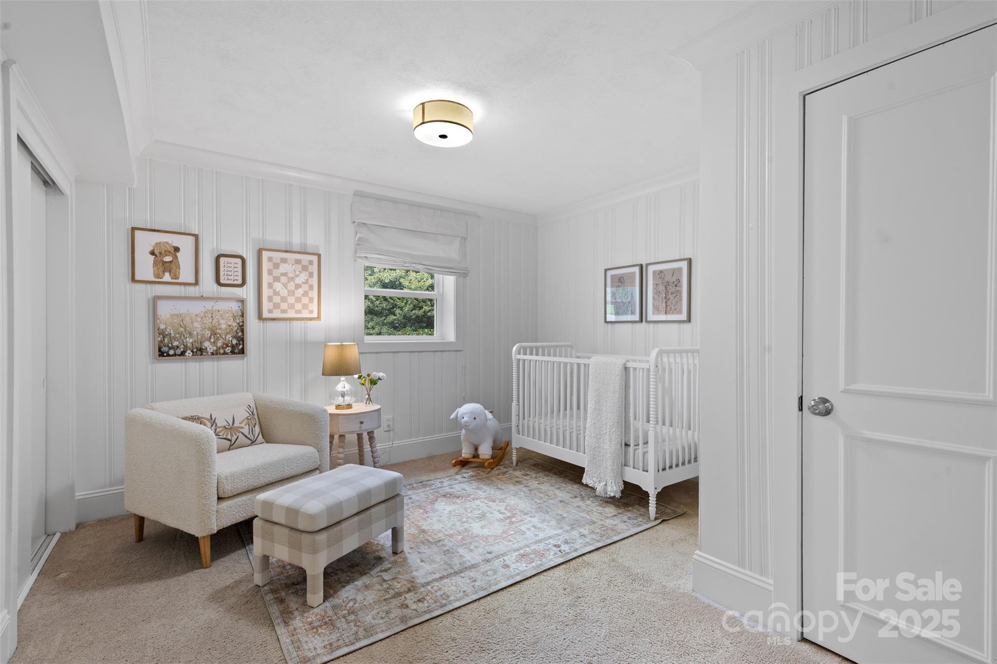 5611 Robinhood Road Charlotte, NC 28211 - Photo 33 of 48 a living room with furniture and a window