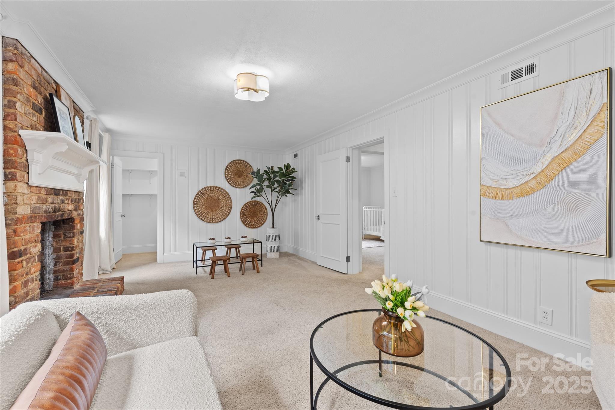 5611 Robinhood Road Charlotte, NC 28211 - Photo 38 of 48 a living room with furniture and a fireplace