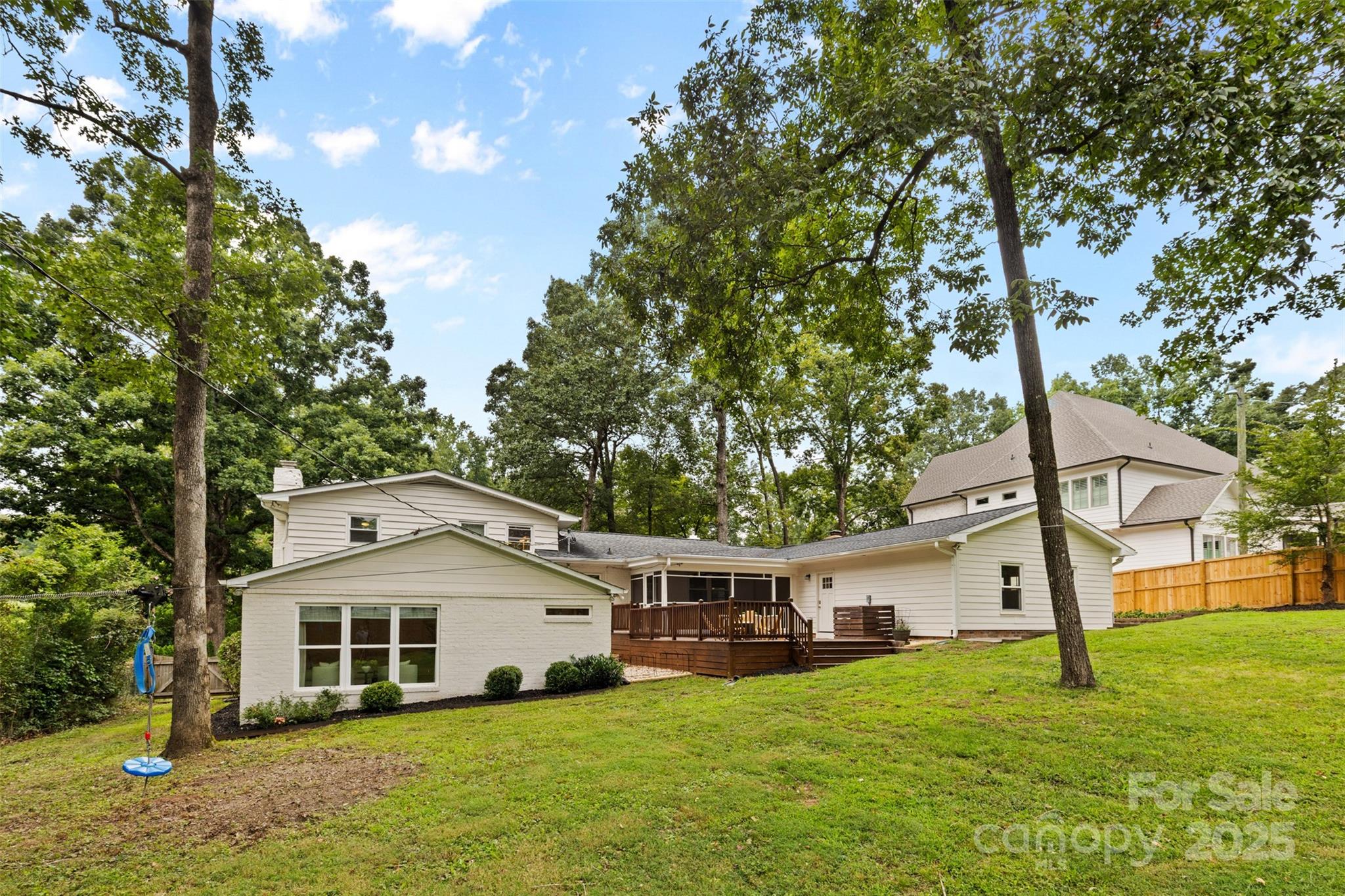 5611 Robinhood Road Charlotte, NC 28211 - Photo 45 of 48 a front view of a house with a yard