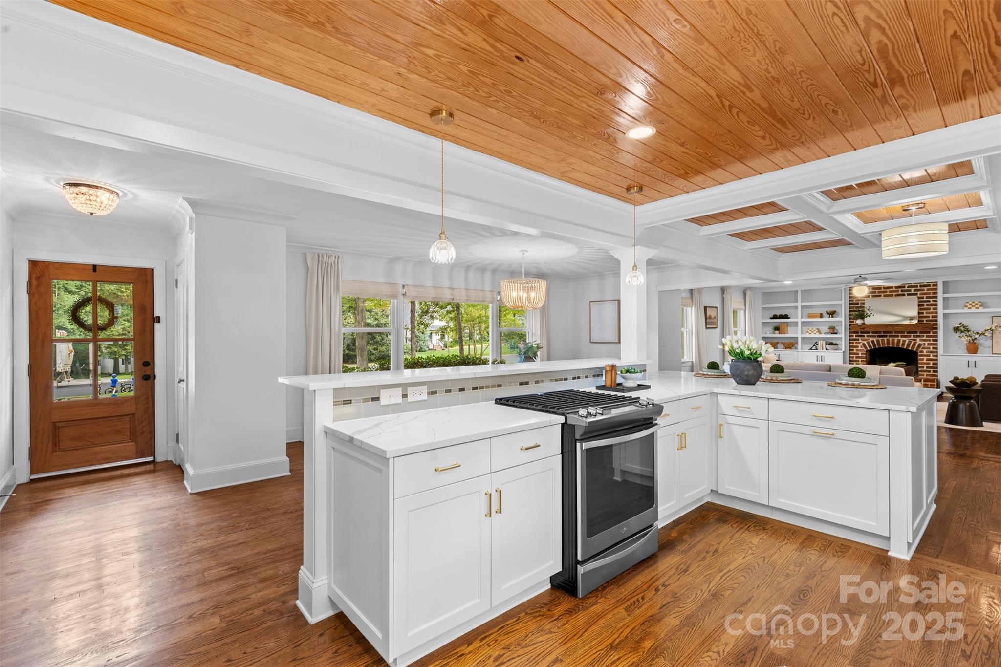 5611 Robinhood Road Charlotte, NC 28211 - Photo 6 of 48 a kitchen with a stove top oven and sink
