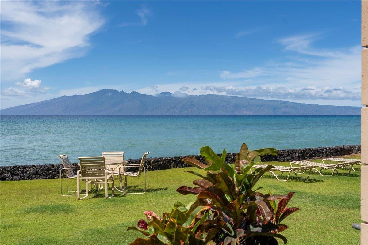 3785 Lower Honoapiilani Road, Unit 107 Lahaina, HI 96761 - Photo 21 of 30 a view of a lake with a mountain in the background