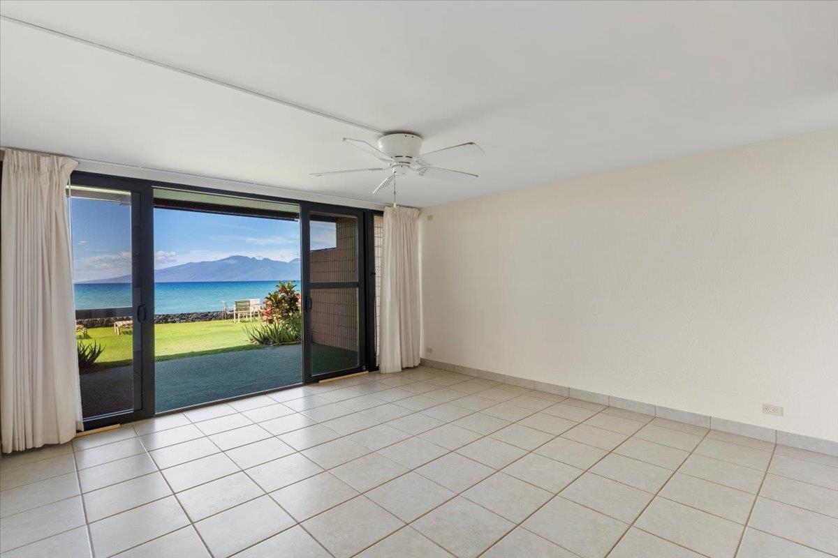 3785 Lower Honoapiilani Road, Unit 107 Lahaina, HI 96761 - Photo 4 of 30 a view of an empty room and window