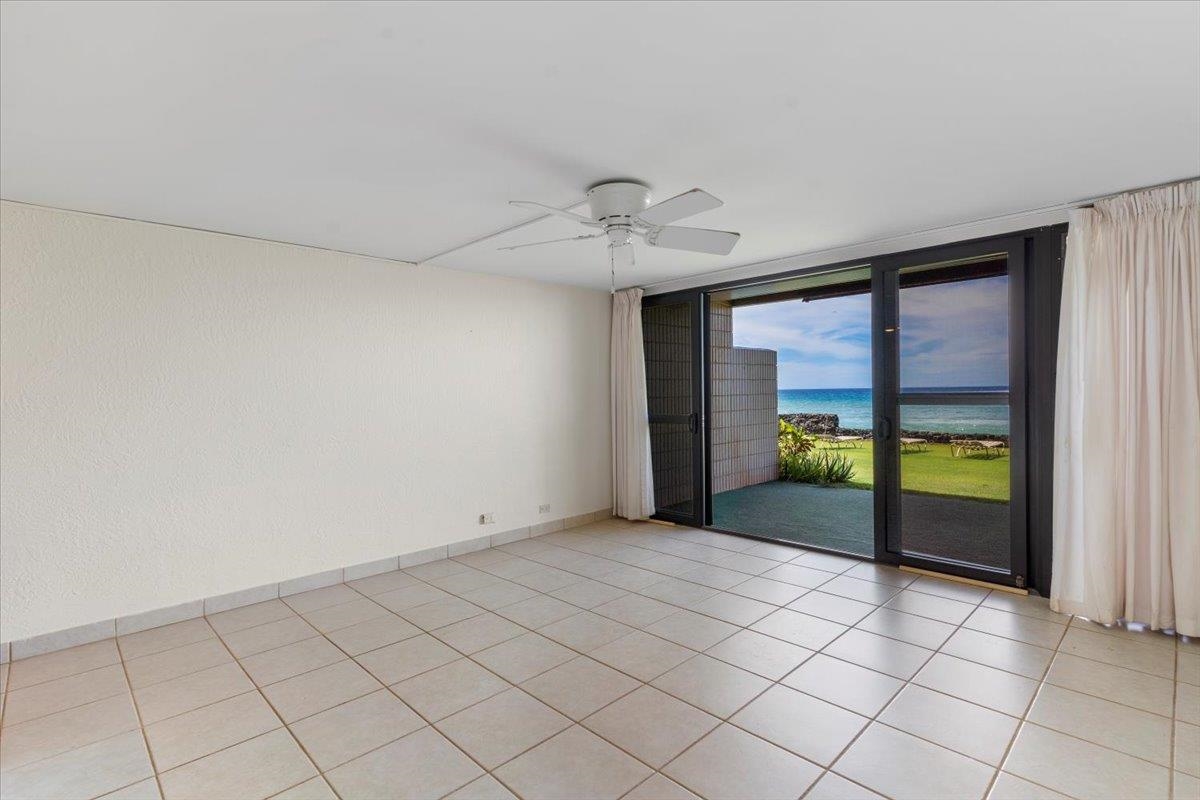 3785 Lower Honoapiilani Road, Unit 107 Lahaina, HI 96761 - Photo 6 of 30 a view of an empty room and window