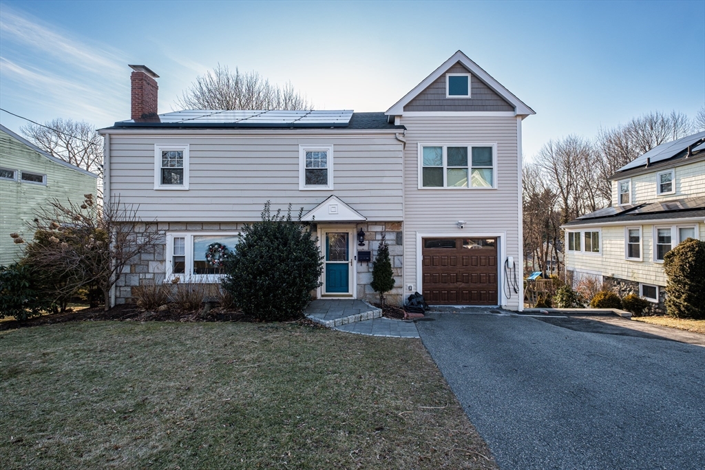 33 Sargent Road Winchester, MA 01890 - Photo 1 of 42 a front view of a house with a yard
