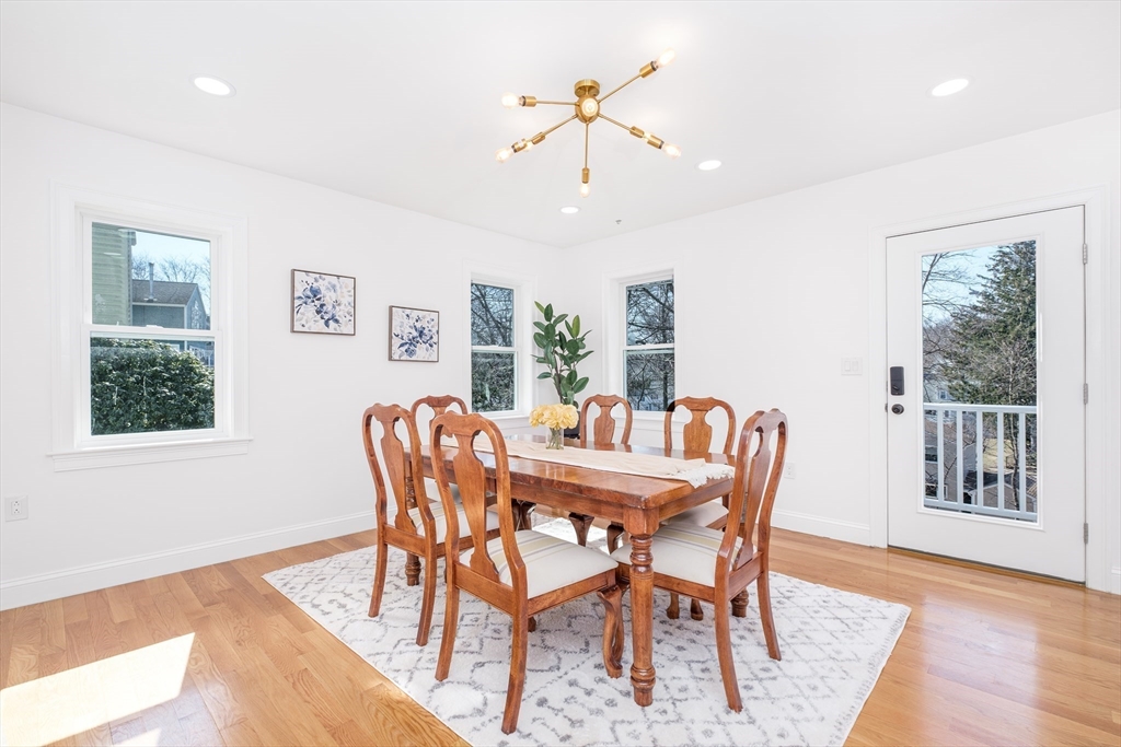 33 Sargent Road Winchester, MA 01890 - Photo 11 of 42 a view of a dining room with furniture window and wooden floor