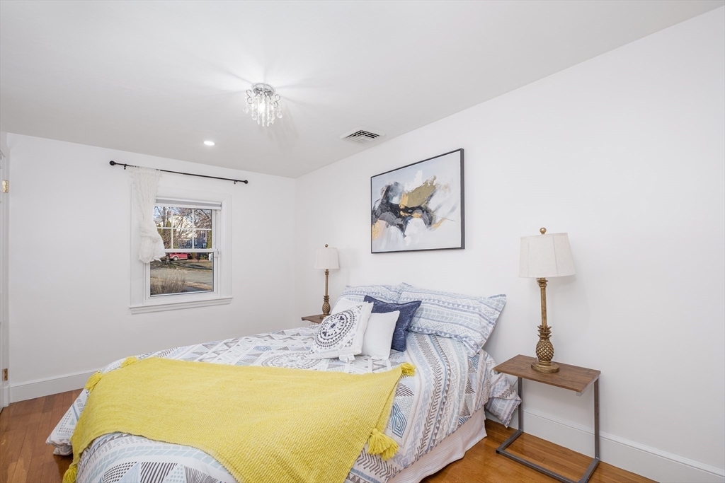 33 Sargent Road Winchester, MA 01890 - Photo 23 of 42 a bedroom with bed and a window