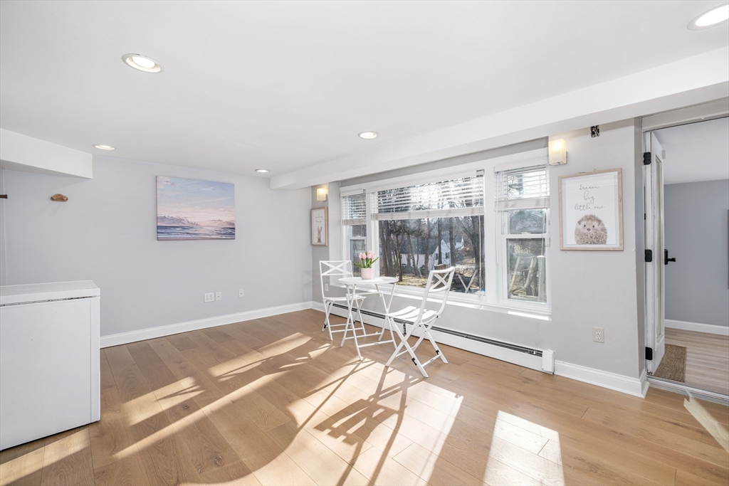 33 Sargent Road Winchester, MA 01890 - Photo 27 of 42 a living room with a large window and furniture