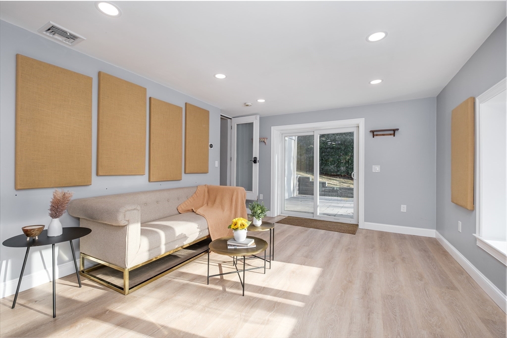 33 Sargent Road Winchester, MA 01890 - Photo 33 of 42 a living room with furniture and a large window