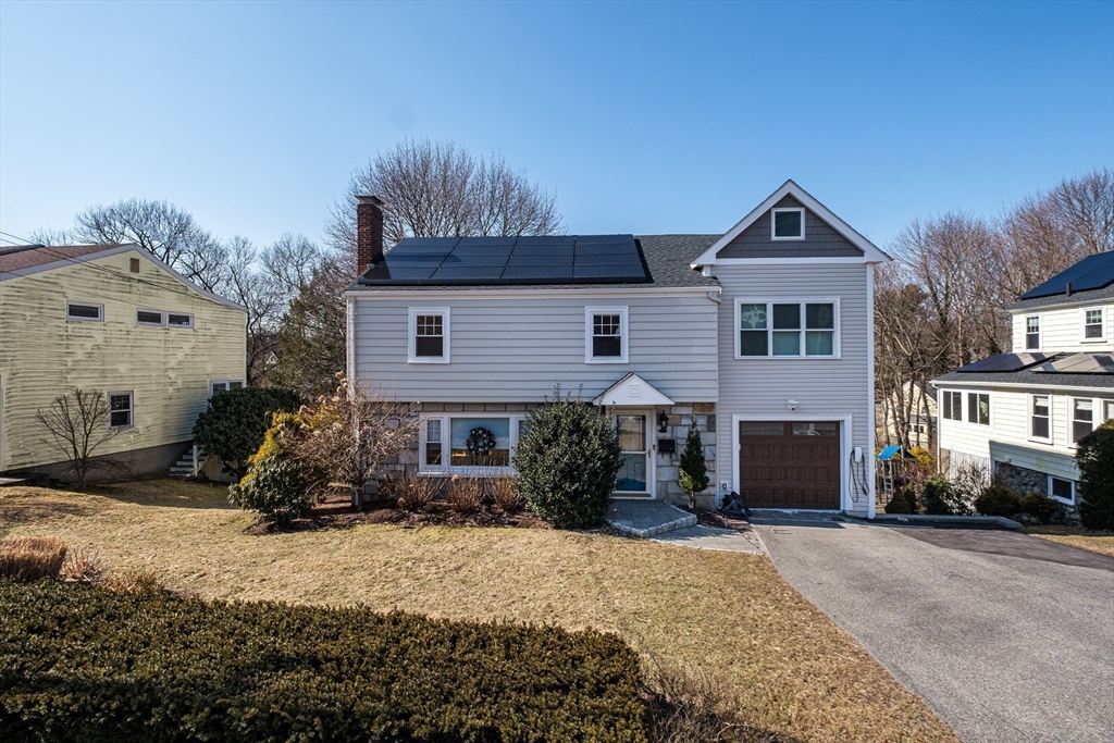 33 Sargent Road Winchester, MA 01890 - Photo 39 of 42 a front view of a house with a yard