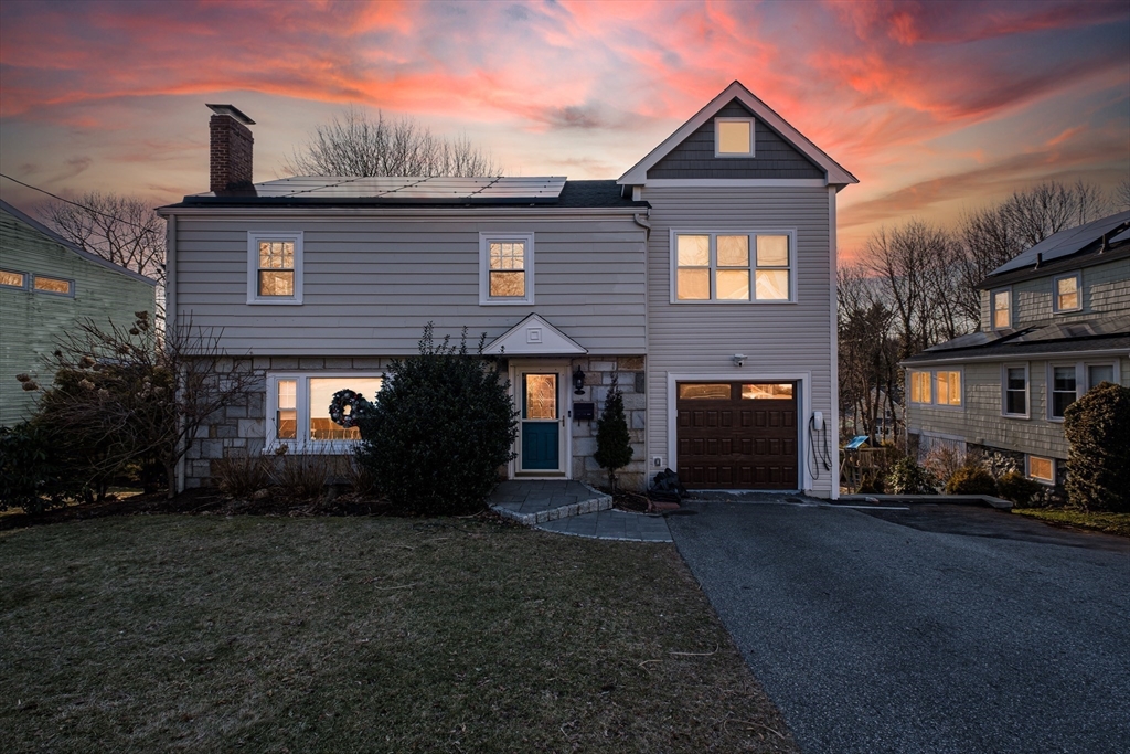33 Sargent Road Winchester, MA 01890 - Photo 41 of 42 a front view of a house with a yard
