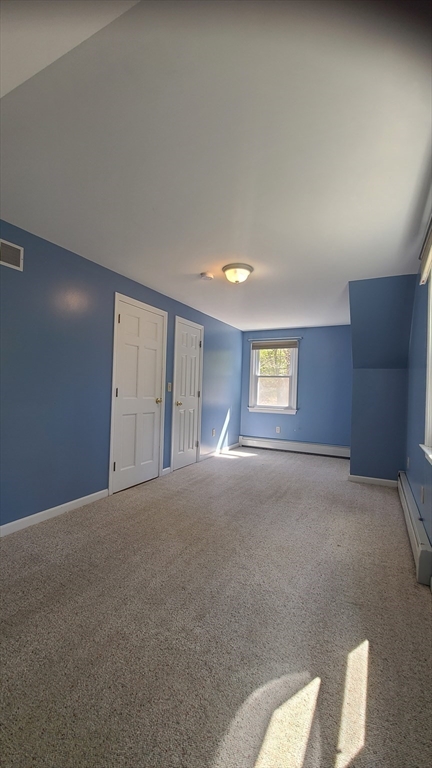56 Cote Road Monson, MA 01057 - Photo 16 of 20 a view of an empty room and a windows