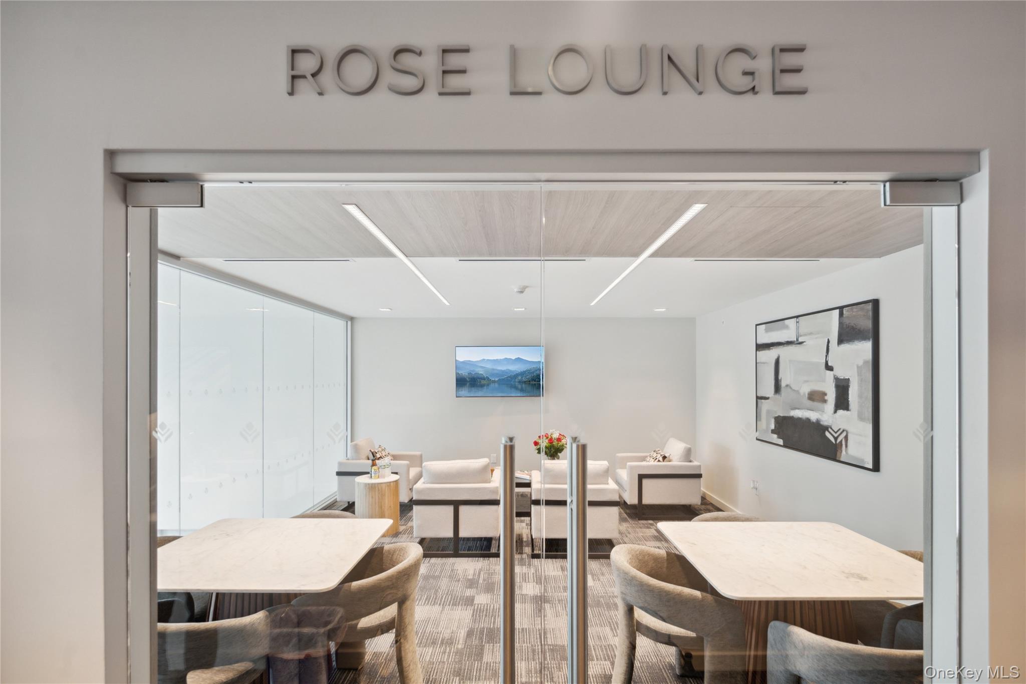 218 Middle Neck Road, Unit 302 Great Neck, NY 11021 - Photo 16 of 30 Dining room featuring expansive windows