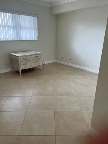 a view of outdoor space with swimming pool and seating space