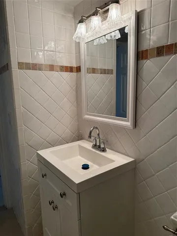 a group of people sitting at tables in a room