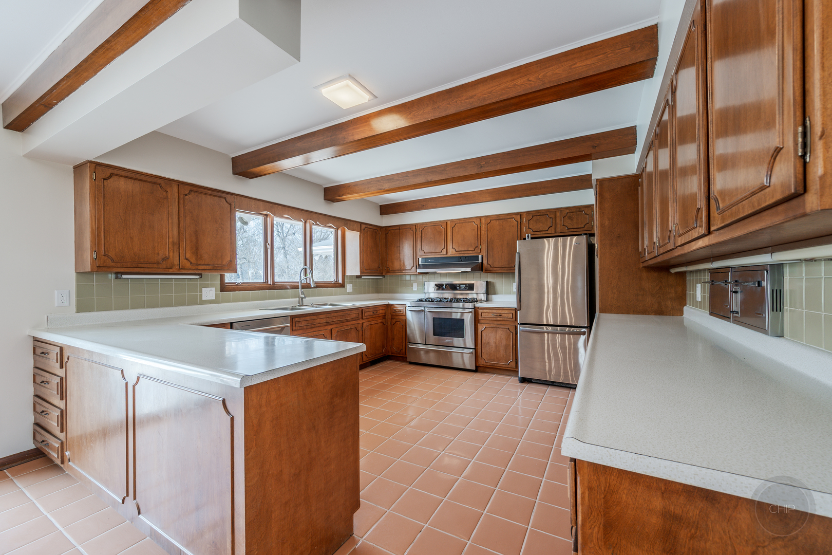 15600 Griswold Springs Road Plano, IL 60545 - Photo 19 of 96 a kitchen with stainless steel appliances granite countertop a sink a stove and a refrigerator