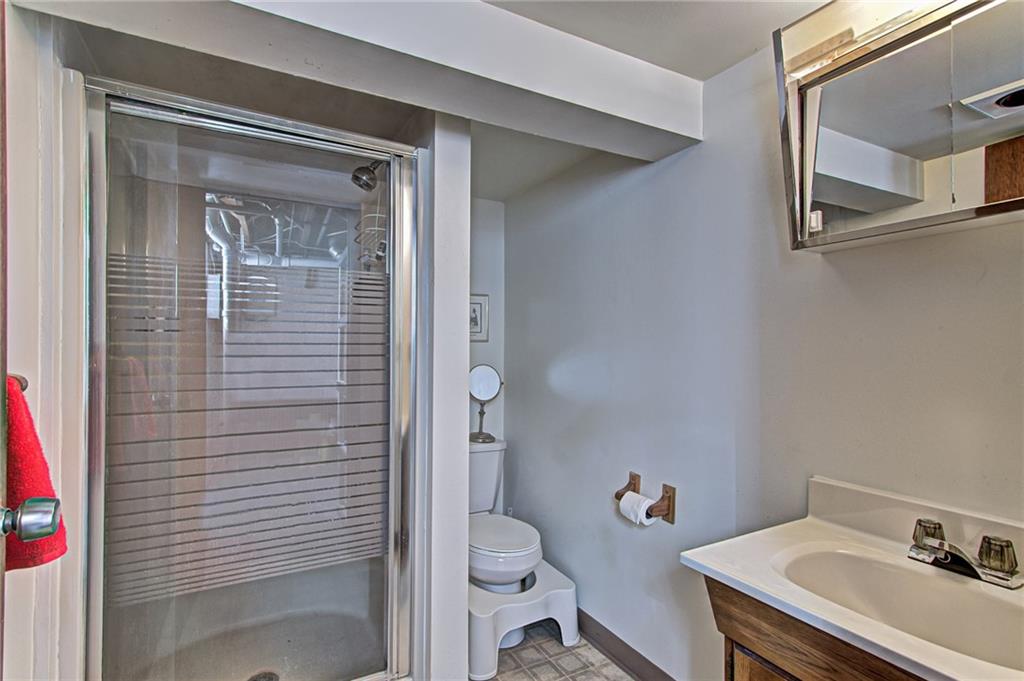 1343 Anderson Road Pittsburgh, PA 15209 - Photo 19 of 20 a bathroom with a granite countertop sink toilet and shower