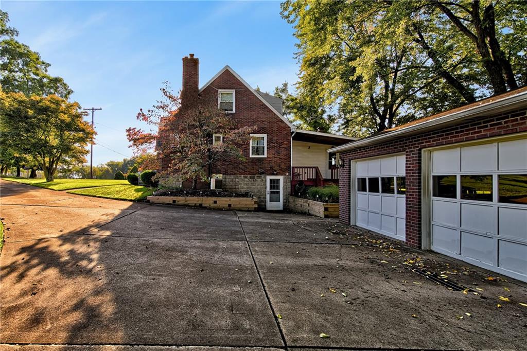 1343 Anderson Road Pittsburgh, PA 15209 - Photo 7 of 20 a view of a house with a yard