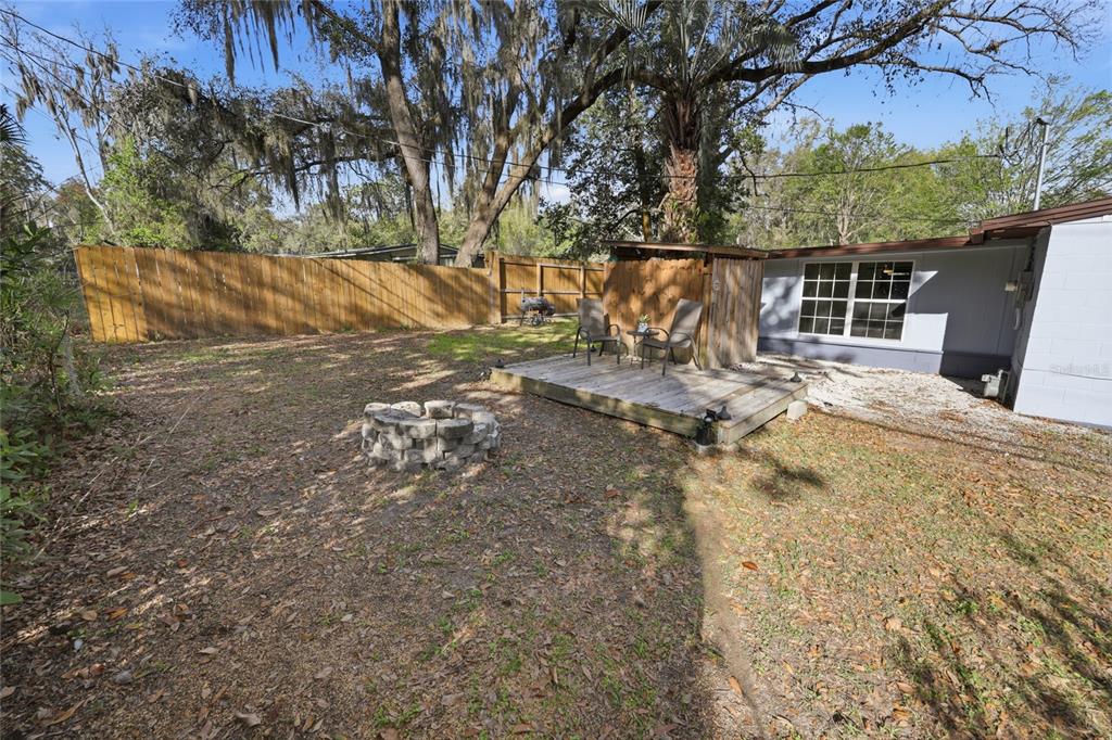 314 Northwest 36th Terrace Gainesville, FL 32607 - Photo 44 of 49 a view of a yard with wooden fence