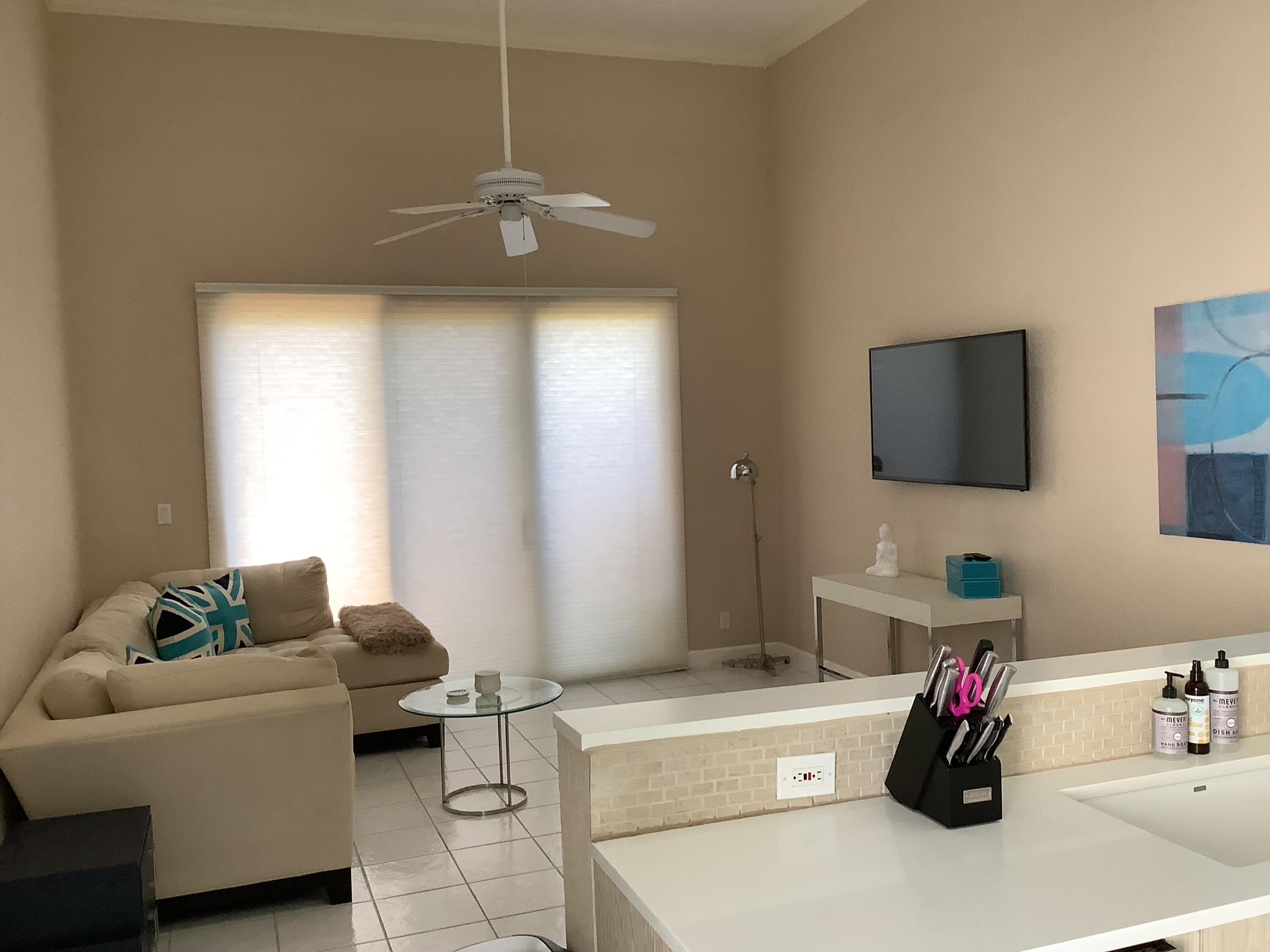 3978 Northwest 57th Street Boca Raton, FL 33496 - Photo 12 of 28 Family Room and Kitchen