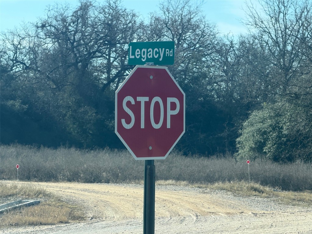 Tbd Tbd Legacy Road Somerville, TX 77879 - Photo 7 of 10 a sign that is on the side of a road