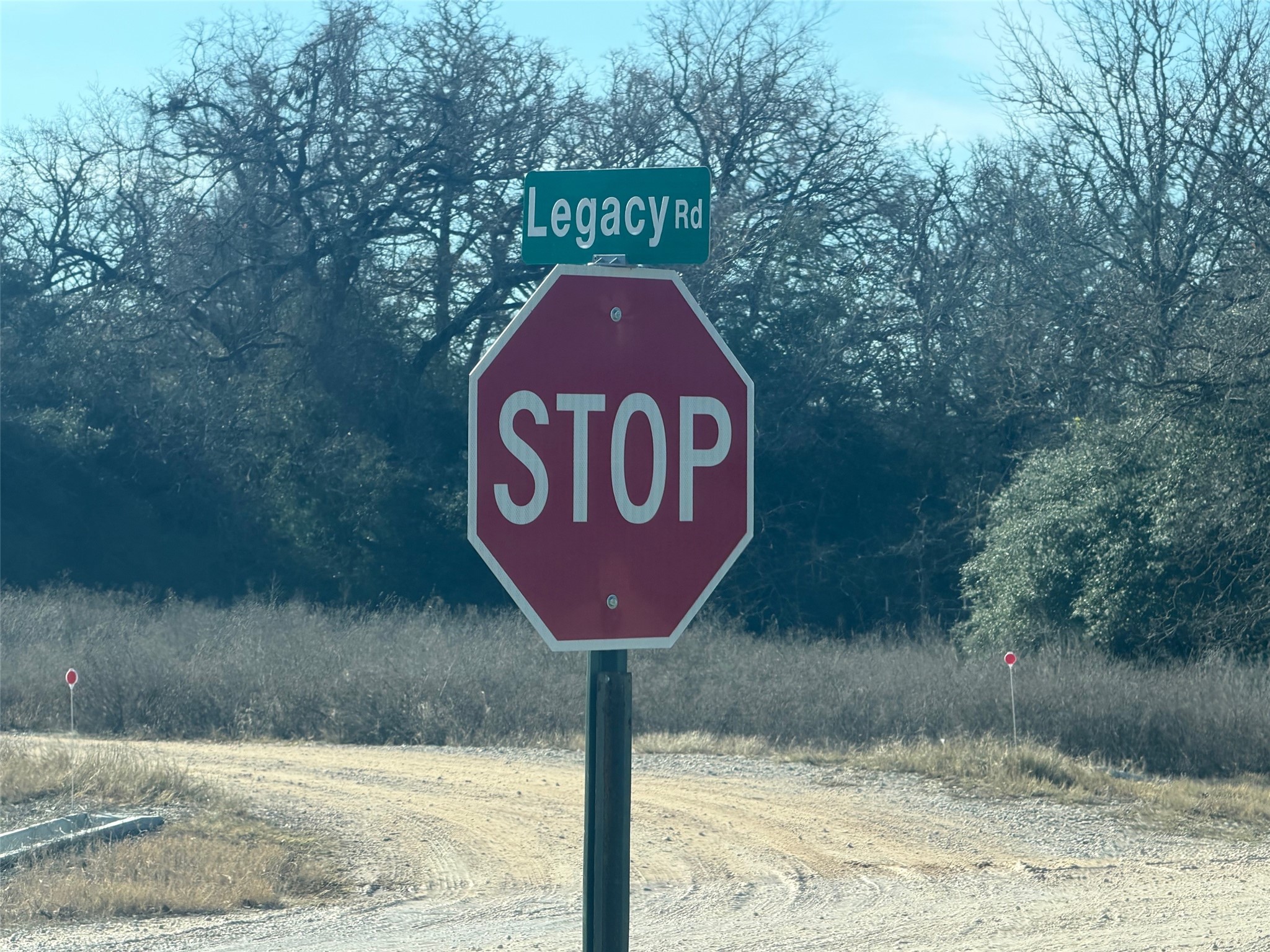 Tbd Tbd Legacy Road Somerville, TX 77879 - Photo 7 of 10 a sign that is on the side of a road