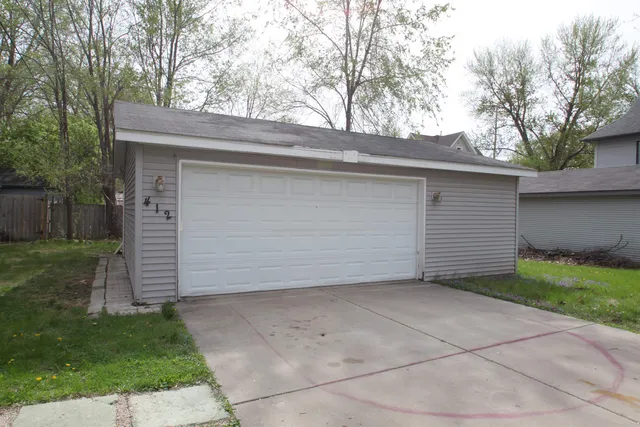 a view of a house with a garage