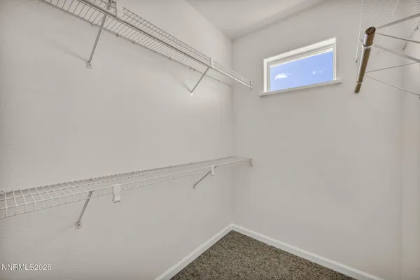 a white bath tub sitting in a bathroom