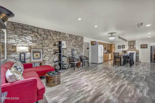 a view of a swimming pool with a table and chairs