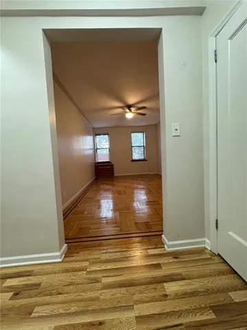 a view of an empty room and window