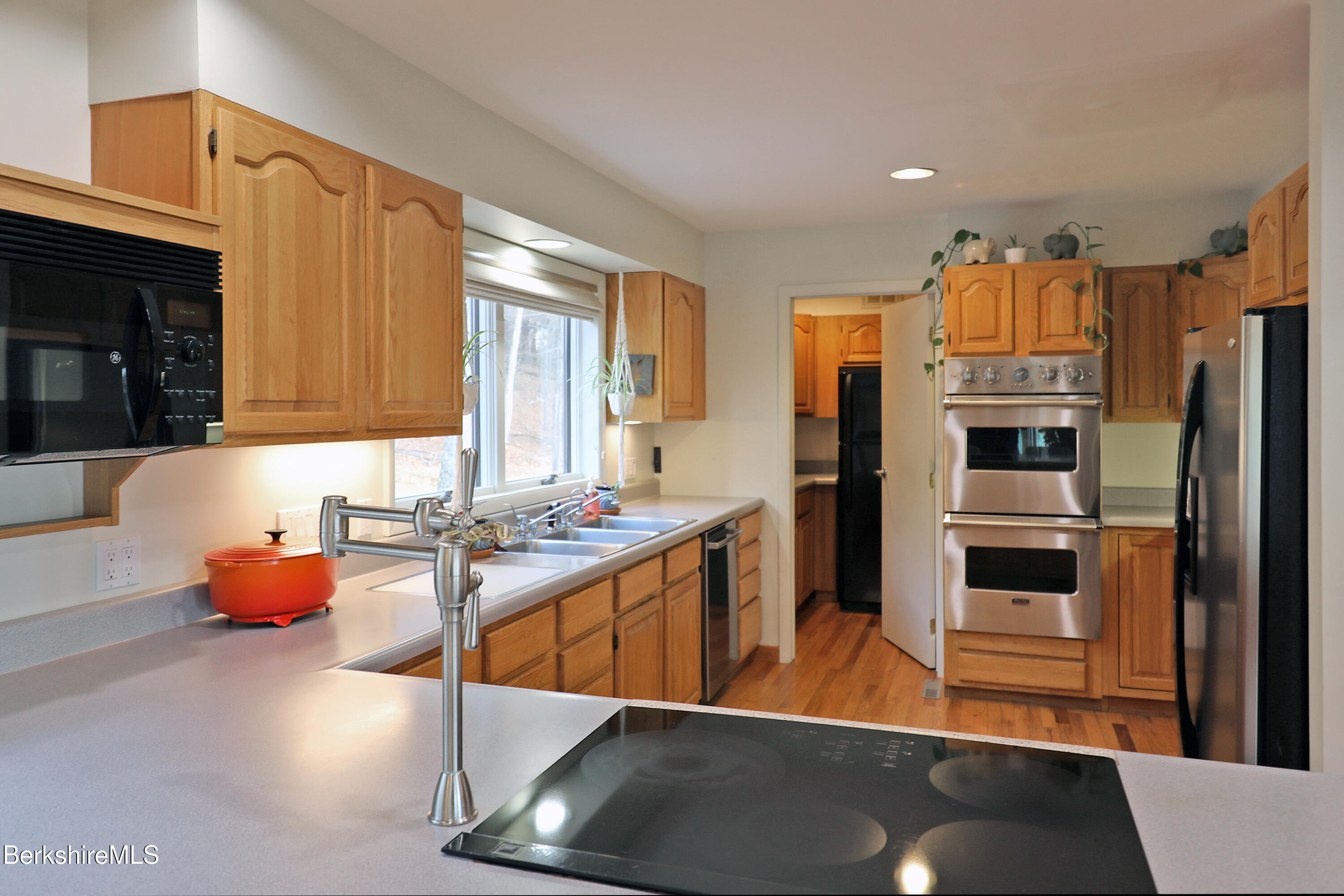126 Temple Road New Lebanon, NY 12125 - Photo 19 of 70 a kitchen with stainless steel appliances a refrigerator and a stove top oven