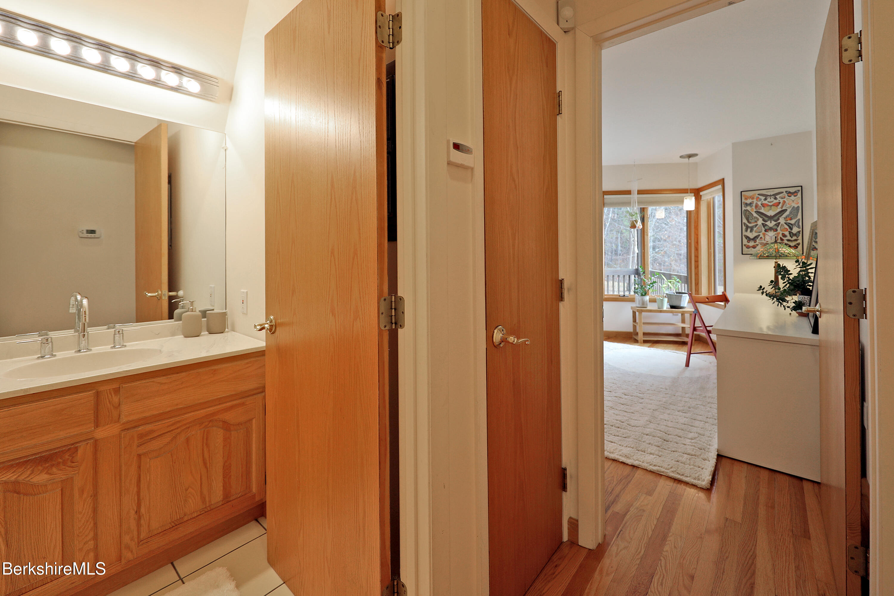 126 Temple Road New Lebanon, NY 12125 - Photo 27 of 70 a en suite bathroom with a sink a mirror and shower