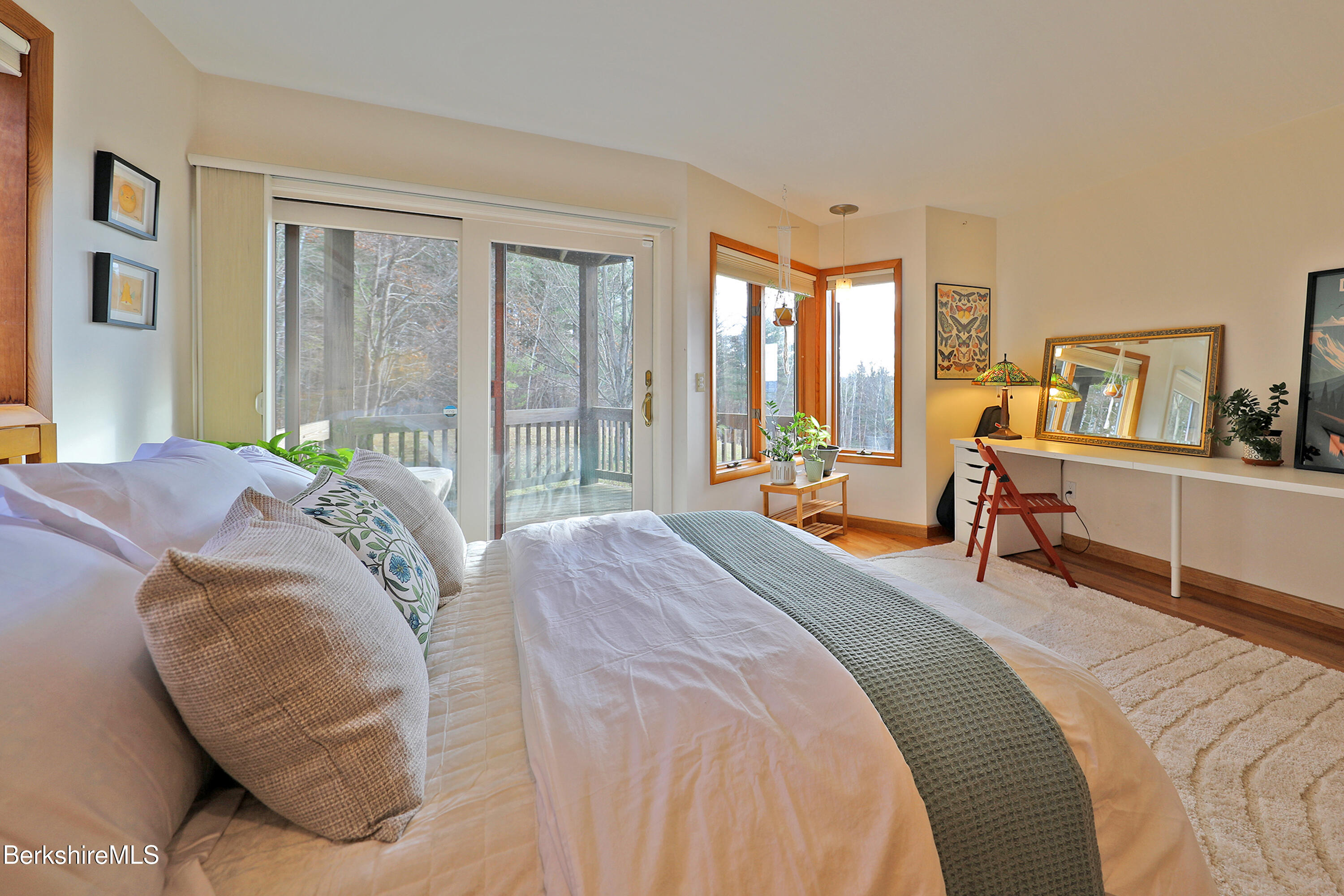 126 Temple Road New Lebanon, NY 12125 - Photo 30 of 70 a bedroom with a bed and large windows