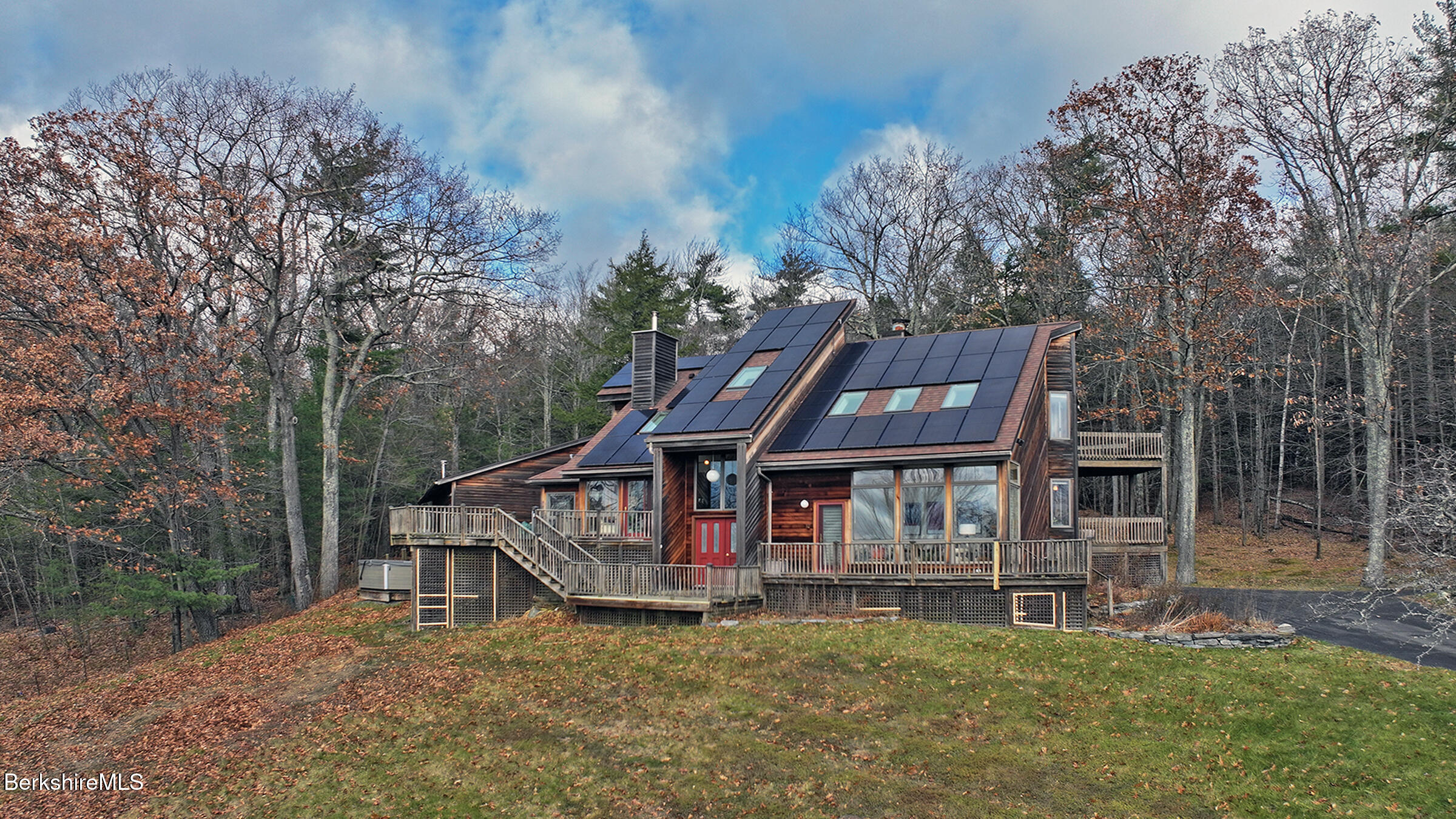 126 Temple Road New Lebanon, NY 12125 - Photo 5 of 70 a backyard of a house with lots of green space table and chairs