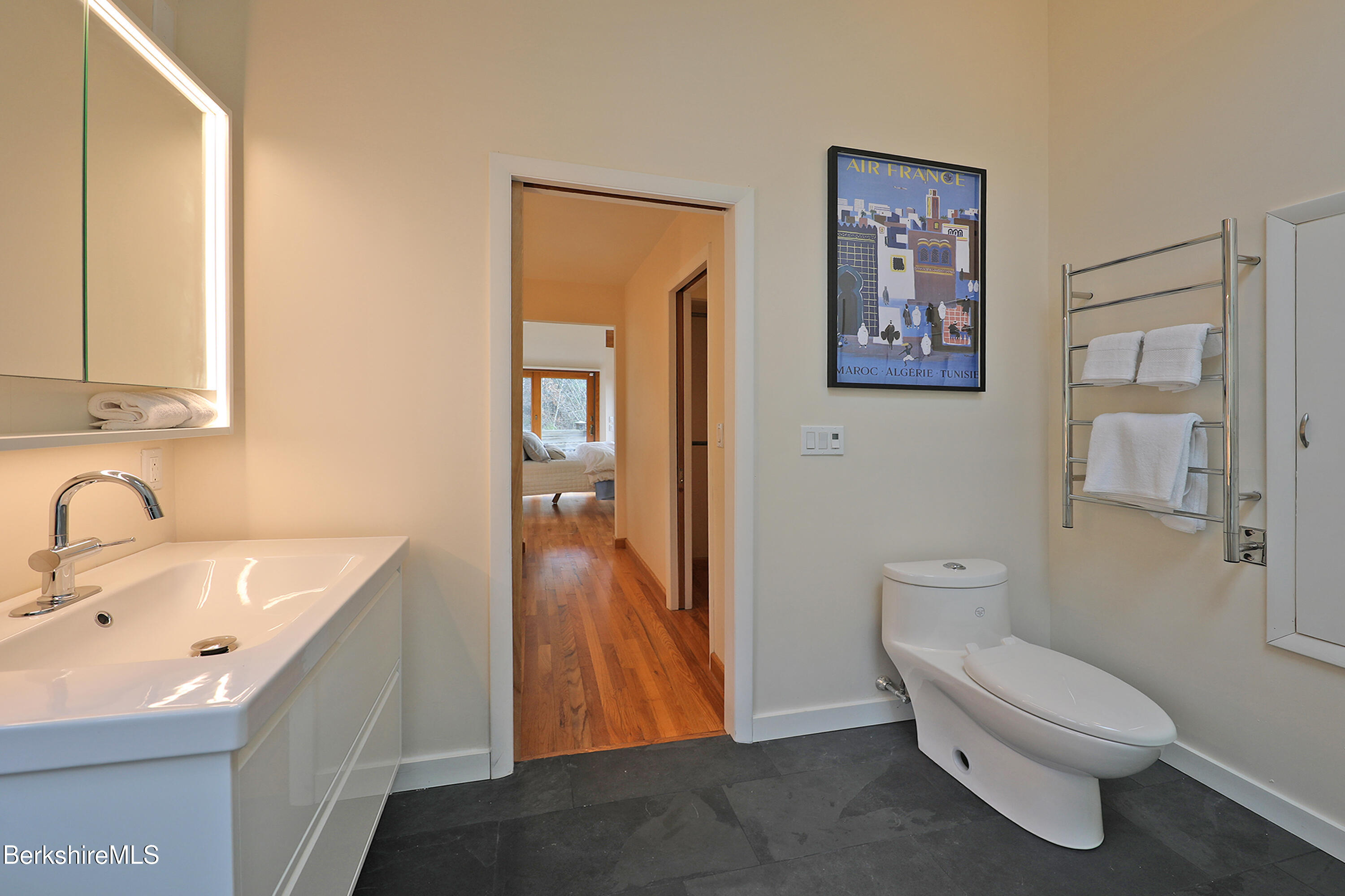 126 Temple Road New Lebanon, NY 12125 - Photo 57 of 70 a bathroom with a toilet sink and mirror