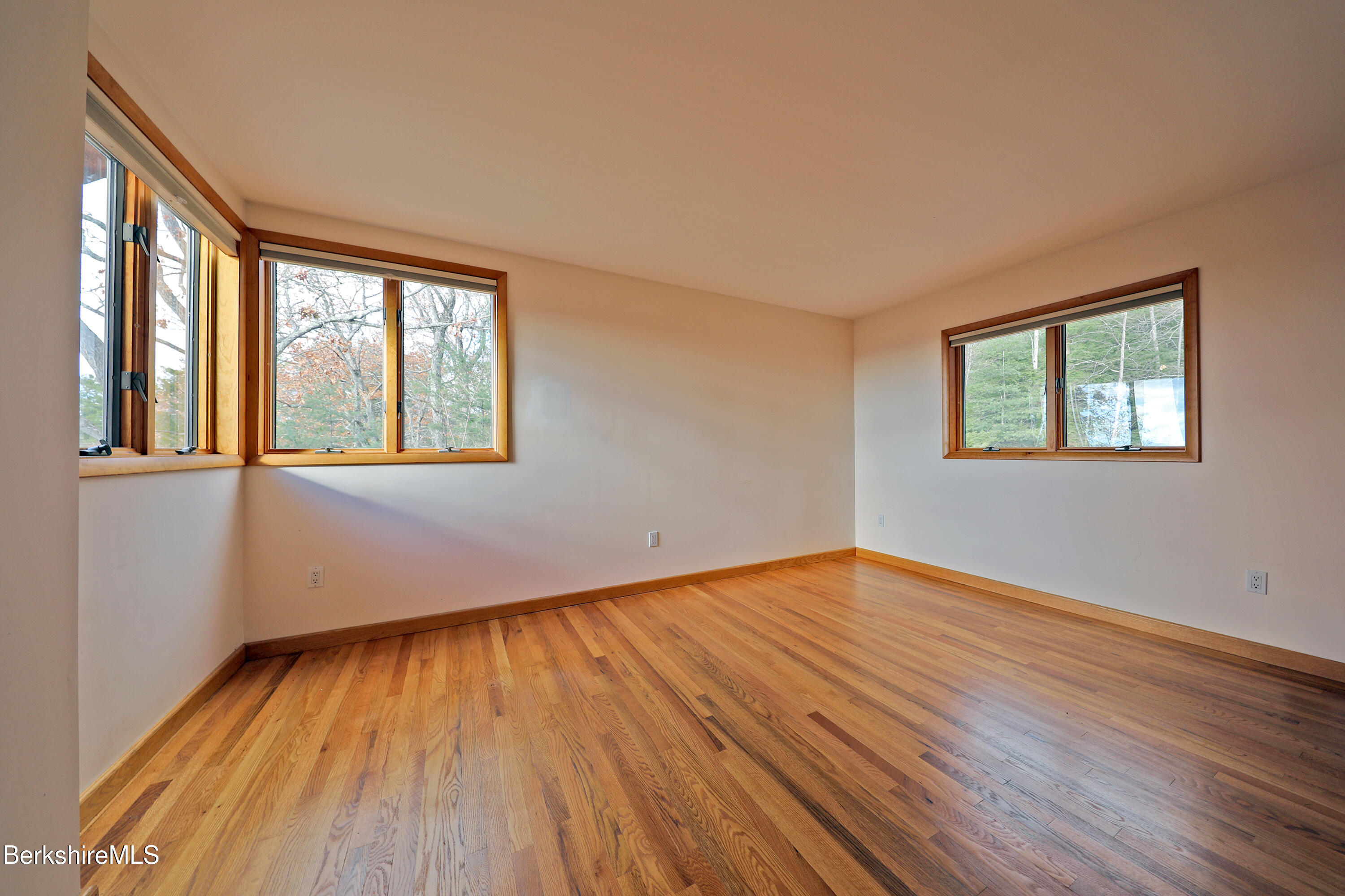 126 Temple Road New Lebanon, NY 12125 - Photo 61 of 70 a view of an empty room with wooden floor and a window
