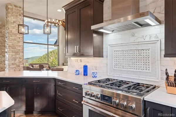 a kitchen with a sink and a window