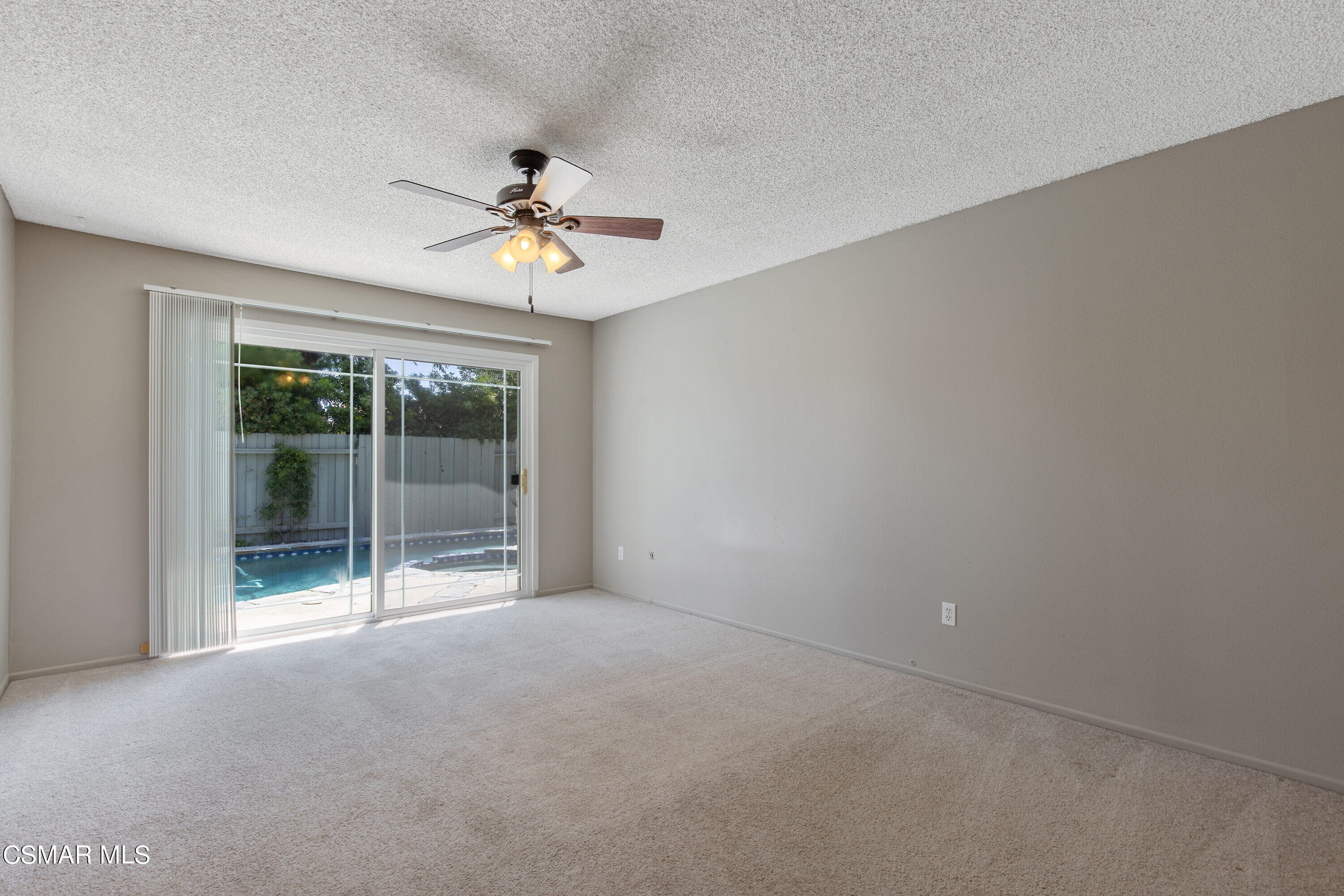 4262 Tecolote Court Moorpark, CA 93021 - Photo 15 of 32 a view of a room with a ceiling fan and window