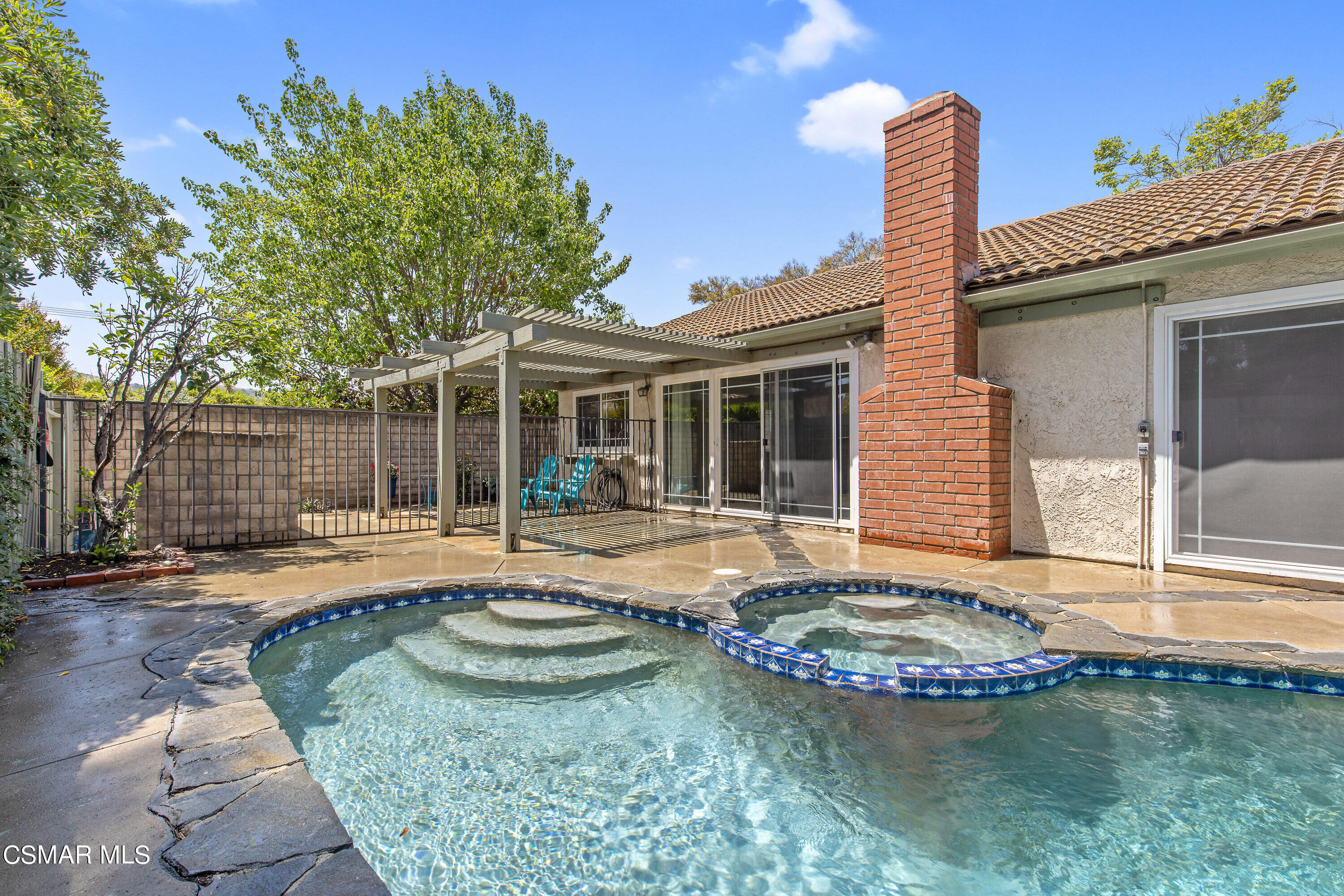 4262 Tecolote Court Moorpark, CA 93021 - Photo 23 of 32 a view of a house with swimming pool and sitting area