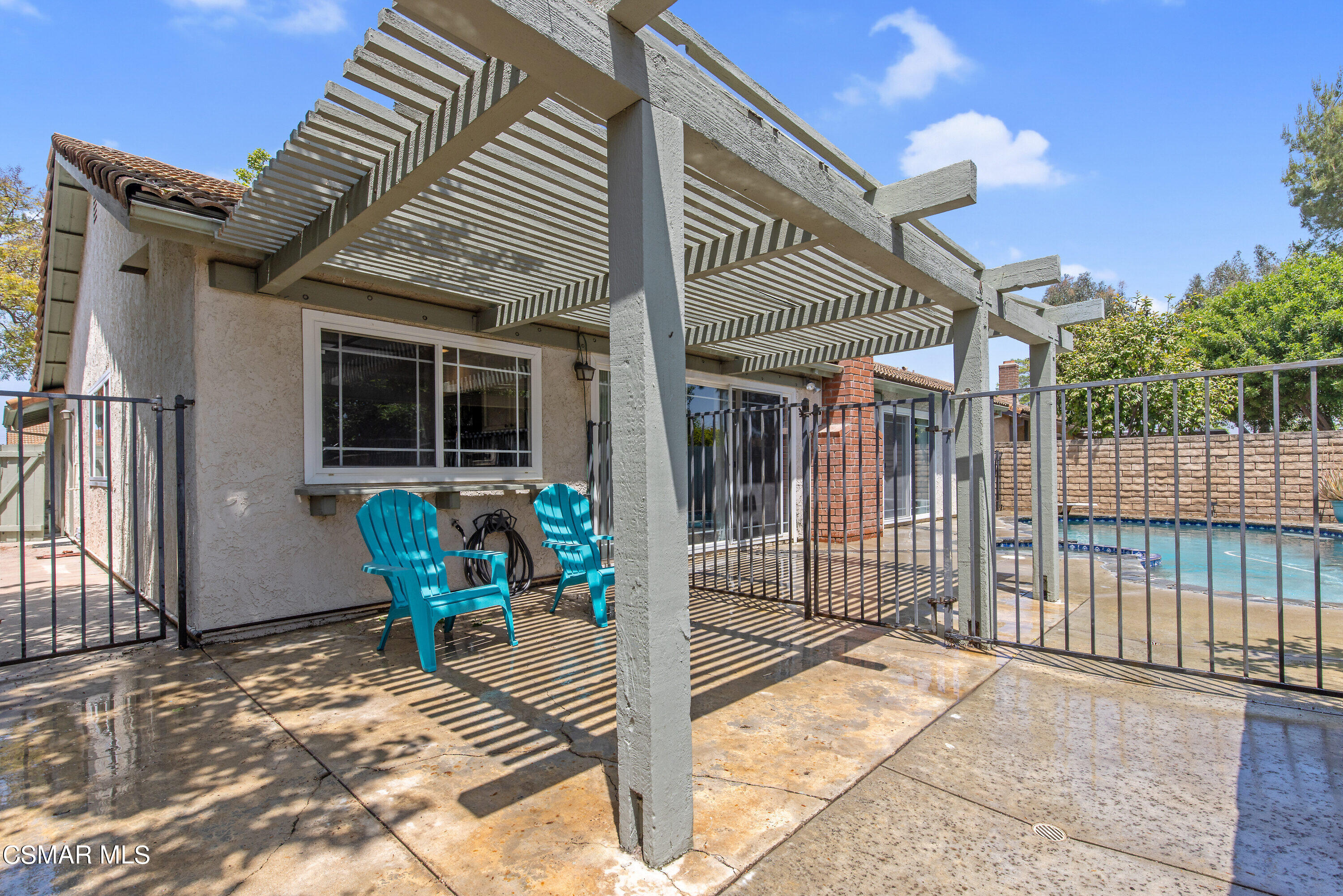 4262 Tecolote Court Moorpark, CA 93021 - Photo 24 of 32 a view of a house with wooden floor fence and a floor to ceiling window
