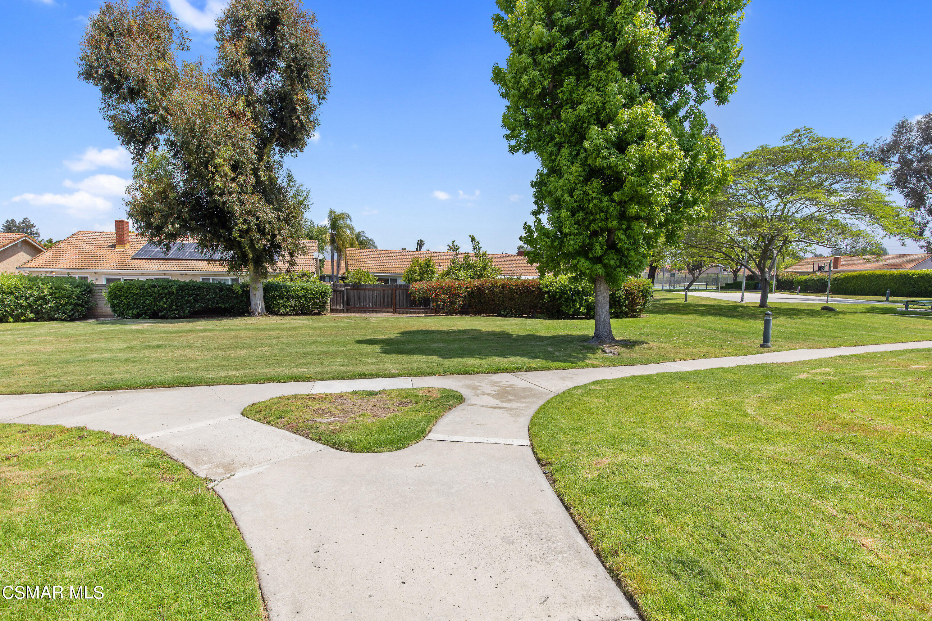 4262 Tecolote Court Moorpark, CA 93021 - Photo 26 of 32 a view of a swimming pool with a yard