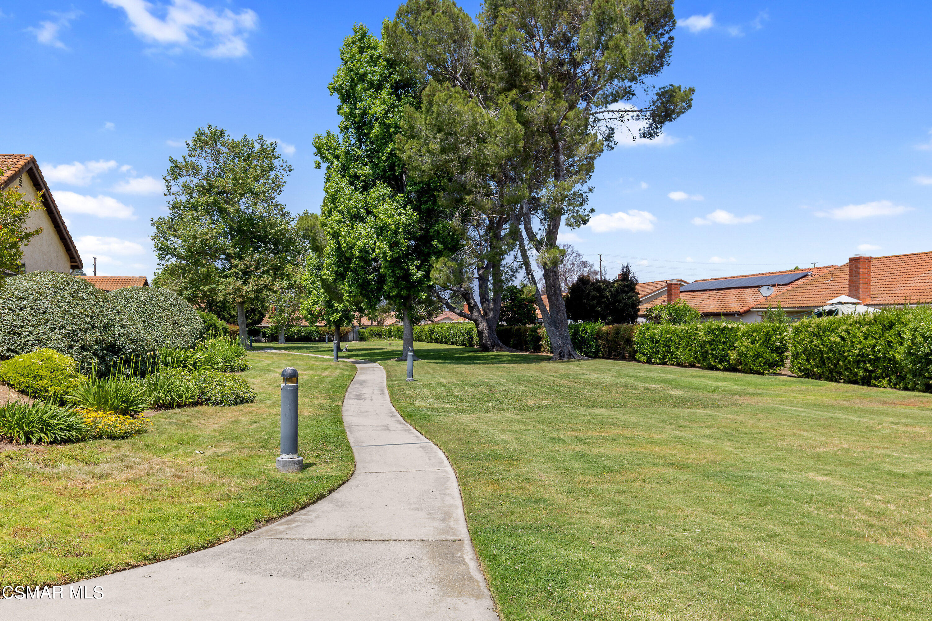 4262 Tecolote Court Moorpark, CA 93021 - Photo 27 of 32 a view of a garden with swimming pool