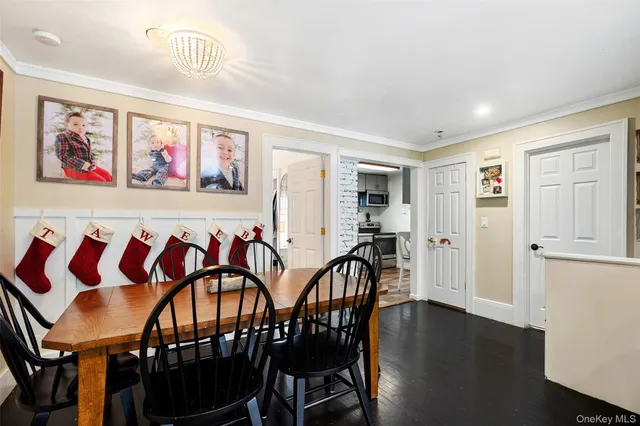 a view of a room with furniture wooden floor and window