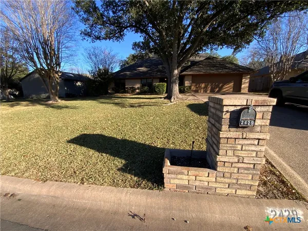 a view of outdoor space yard and swimming pool