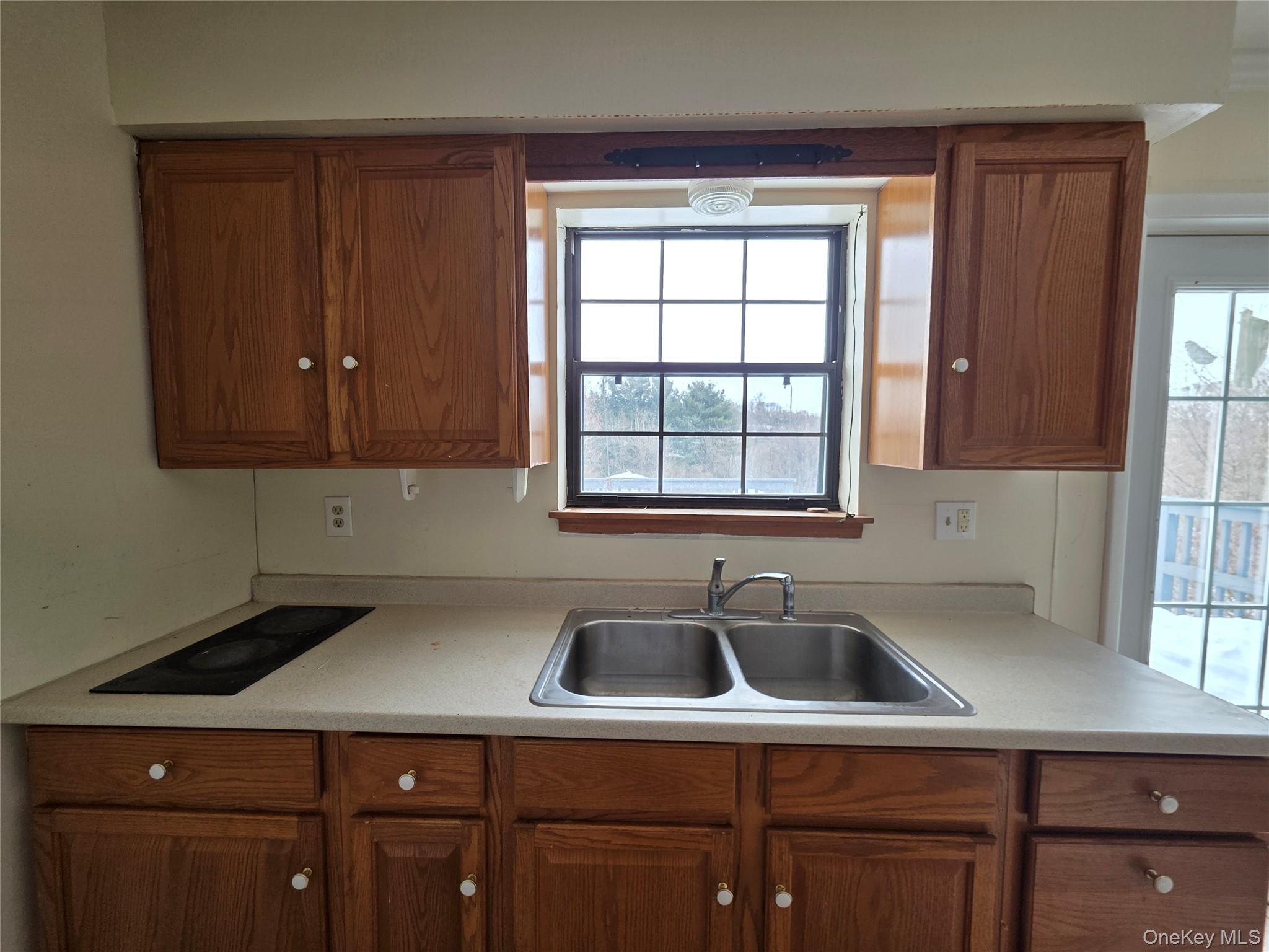 234 Prospect Road, Unit 2 Monroe, NY 10950 - Photo 16 of 19 a kitchen with a sink cabinets and window
